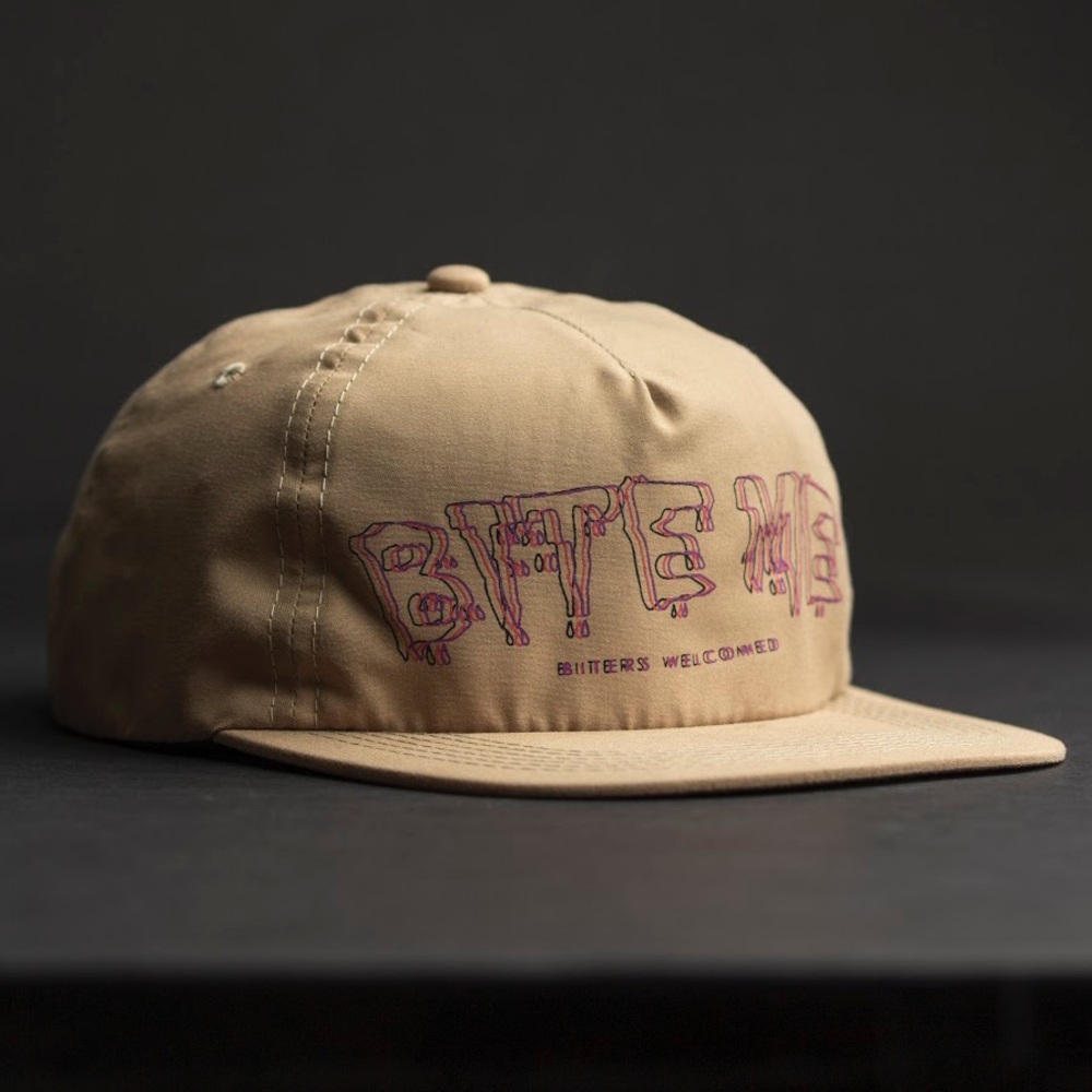NWT “Bite Me” Hat - Tan